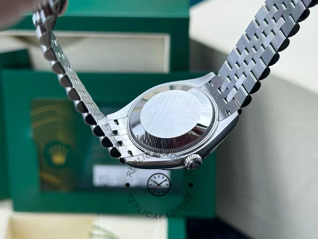  Photo of the caseback of the Rolex Datejust 31 mm 278274-0018 after 2 years of actual use, showing the brushed steel bottom and crown.